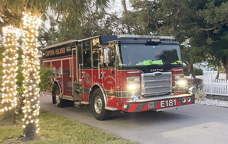 The CIHS had arranged for Kristie, her husband Red, and a few close friends to arrive at the event in the Captiva Island fire truck
