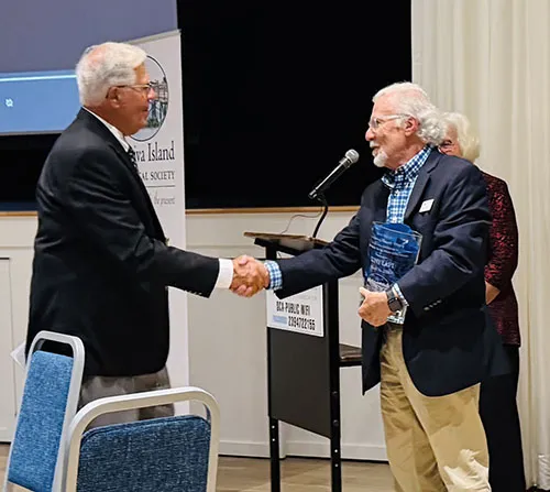 Tom Libonate, CIHS president and Betty Anholt, the award's namesake, present the award to Tony Lapi