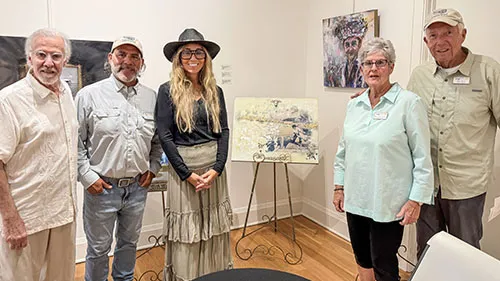 CIHS board members and artist Ilie Ruby with the painting the CIHS purchased to gift to Ralph Woodring  (from the left: Tom Libonate, Brian Holoway, Ms. Ruby, Mary Jane Vinson, Mike Boris)