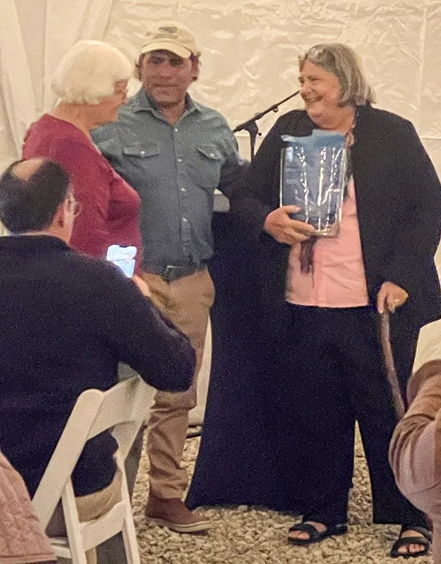 Kristie receives the Betty Anholt Guardian of History Award from the awards namesake and CIHS Director Betty Anholt and CIHS Director Captain Brian Holaway